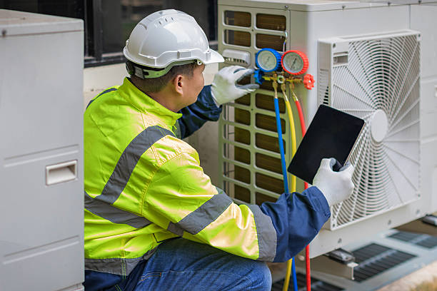 Professional Hvac Installation technician working in Forest Park, GA